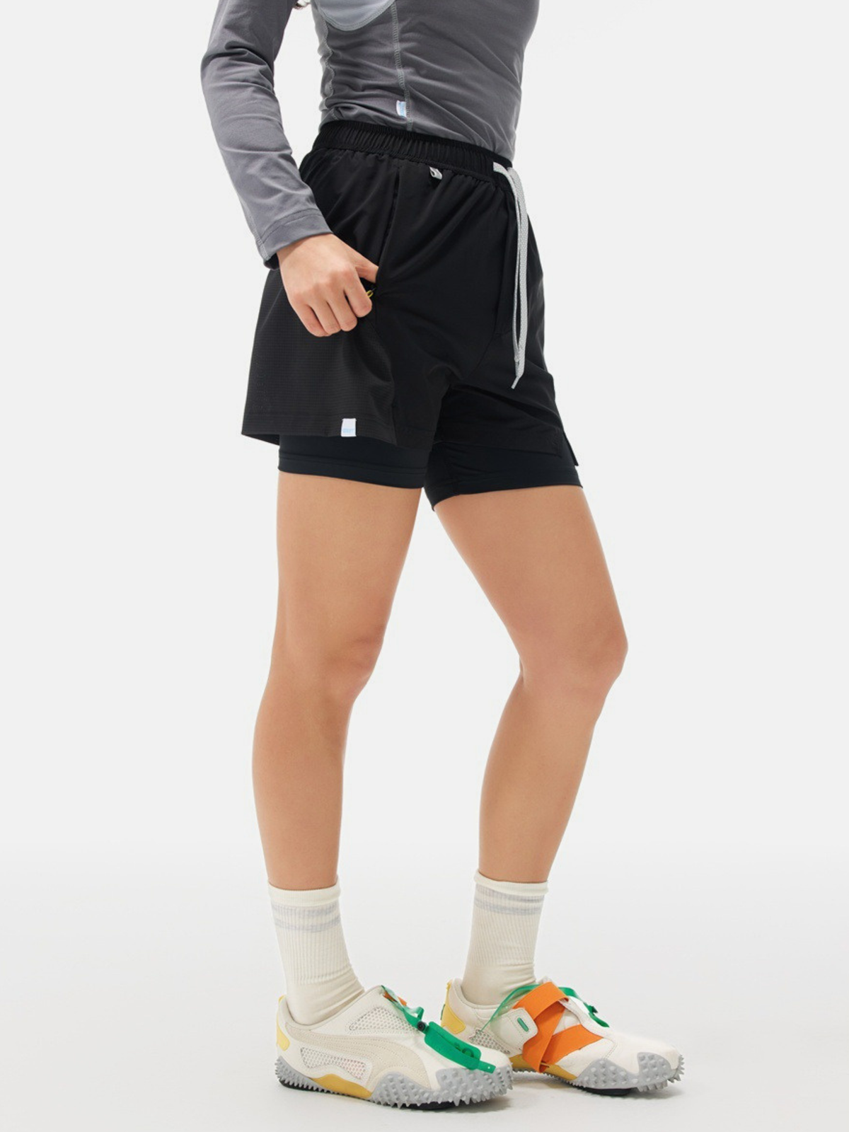 AlpGear – Schnelltrocknende 2-in-1-Athletikshorts mit Wetterschutz