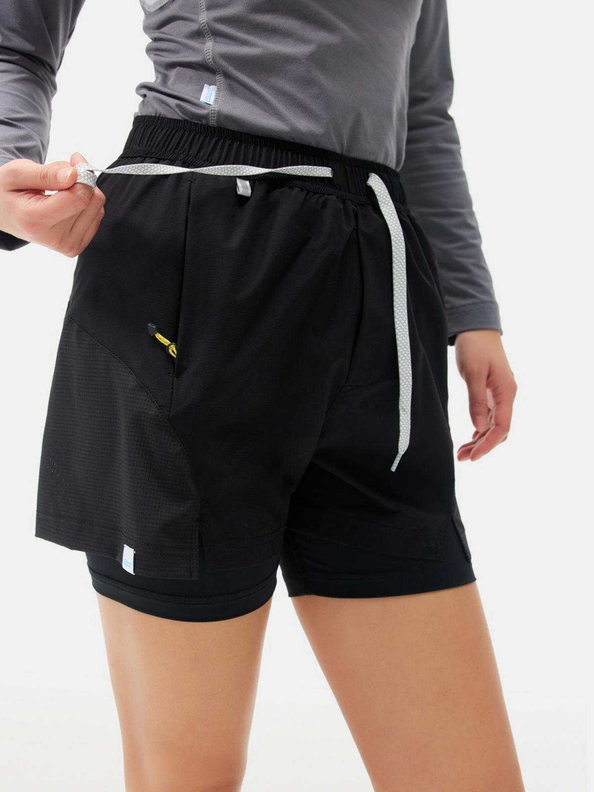 AlpGear – Schnelltrocknende 2-in-1-Athletikshorts mit Wetterschutz